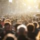 An image of a blurred crowd of unrecognisable people in the street